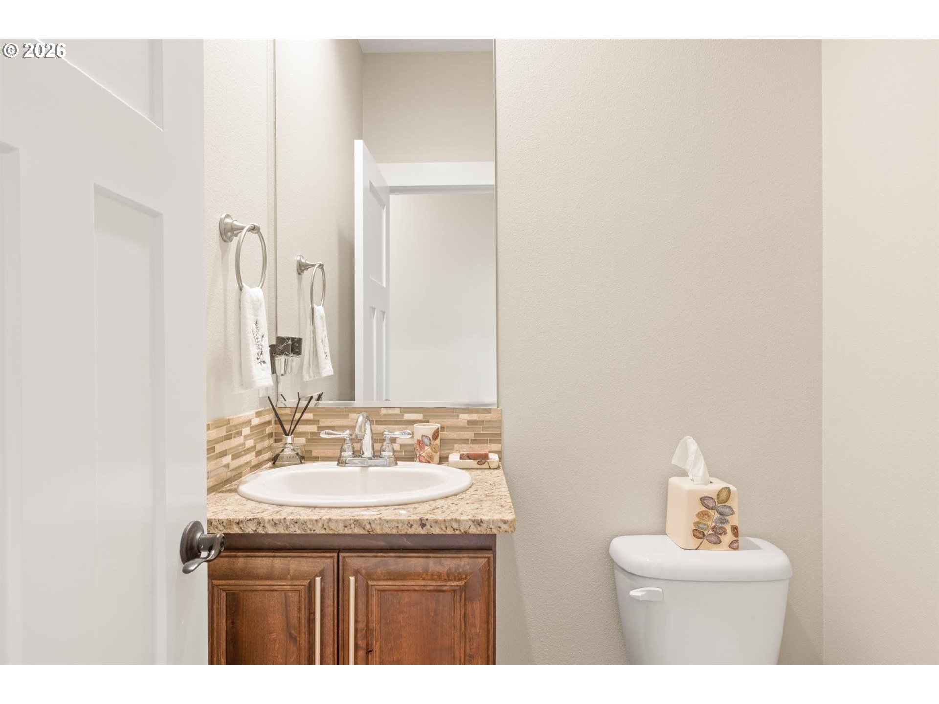 1274 South 15th Way Ridgefield, WA 98642 - Photo 29 of 46 a bathroom with a sink and a mirror