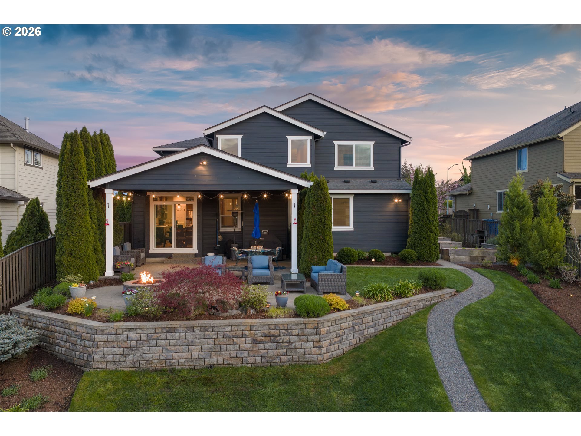 1274 South 15th Way Ridgefield, WA 98642 - Photo 31 of 46 a front view of a house with porch and garden