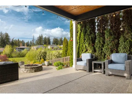 a view of a garden with an outdoor space