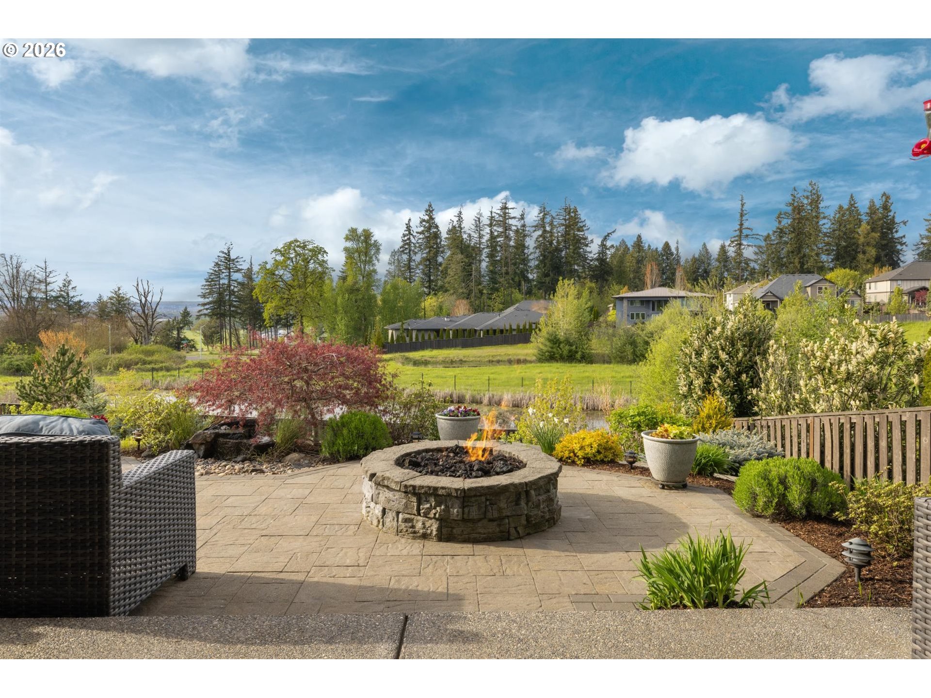 1274 South 15th Way Ridgefield, WA 98642 - Photo 36 of 46 a view of a patio with a table and chairs