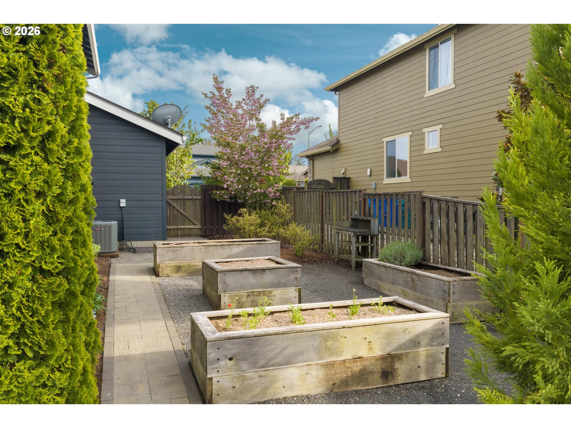 1274 South 15th Way Ridgefield, WA 98642 - Photo 39 of 46 a view of house with yard outdoor seating and entertaining space