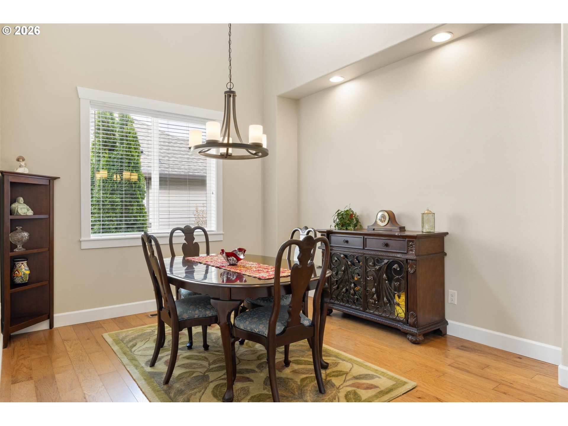1274 South 15th Way Ridgefield, WA 98642 - Photo 8 of 46 a view of a dining room with furniture and a chandelier