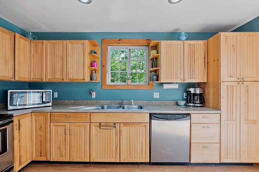 540 Royalston Road Phillipston, MA 01331 - Photo 14 of 38 a kitchen with stainless steel appliances granite countertop a refrigerator and a sink