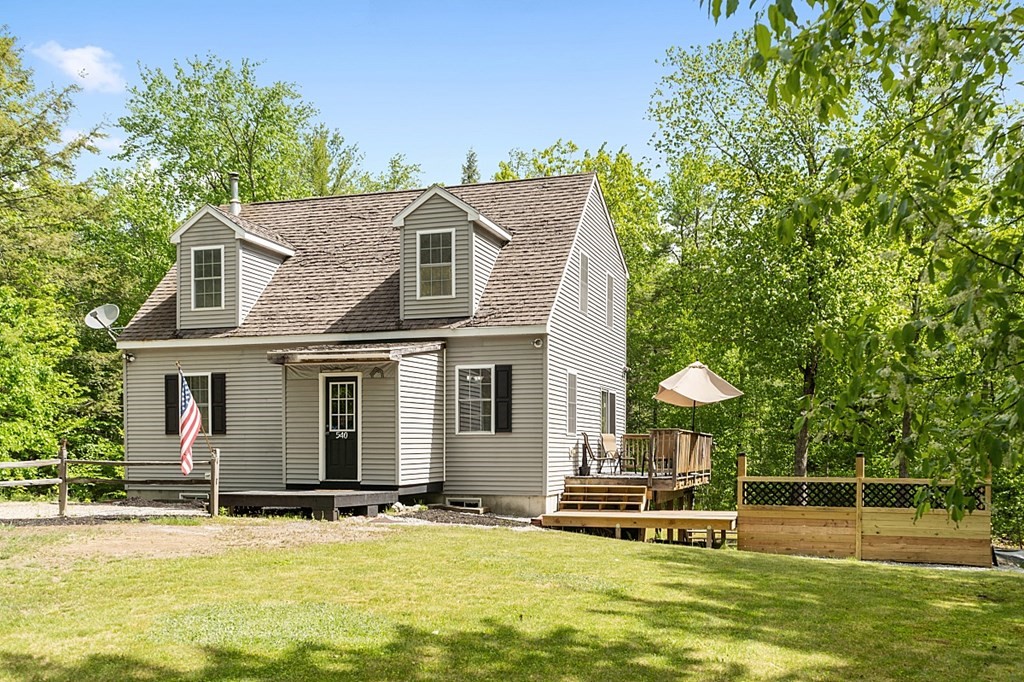 540 Royalston Road Phillipston, MA 01331 - Photo 34 of 38 a backyard of a house with table and chairs
