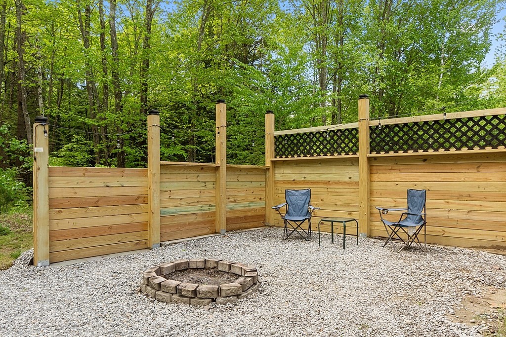 540 Royalston Road Phillipston, MA 01331 - Photo 37 of 38 a backyard of a house with table and chairs