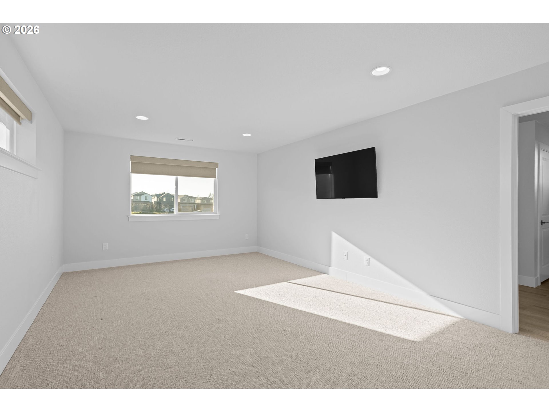 719 Northwest 178th Street Ridgefield, WA 98642 - Photo 26 of 46 a view of an empty room with a window