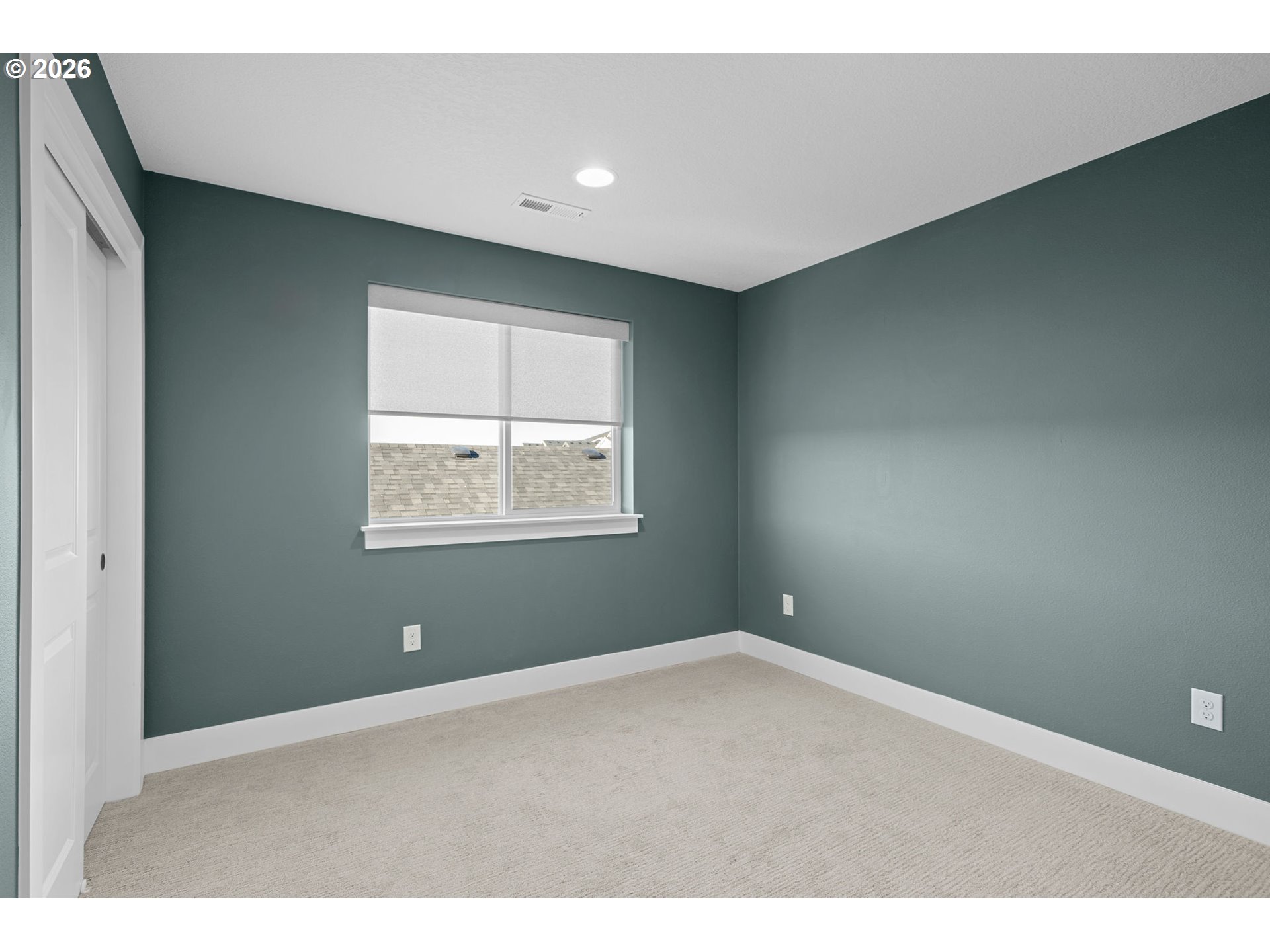 719 Northwest 178th Street Ridgefield, WA 98642 - Photo 33 of 46 a view of an empty room with a window