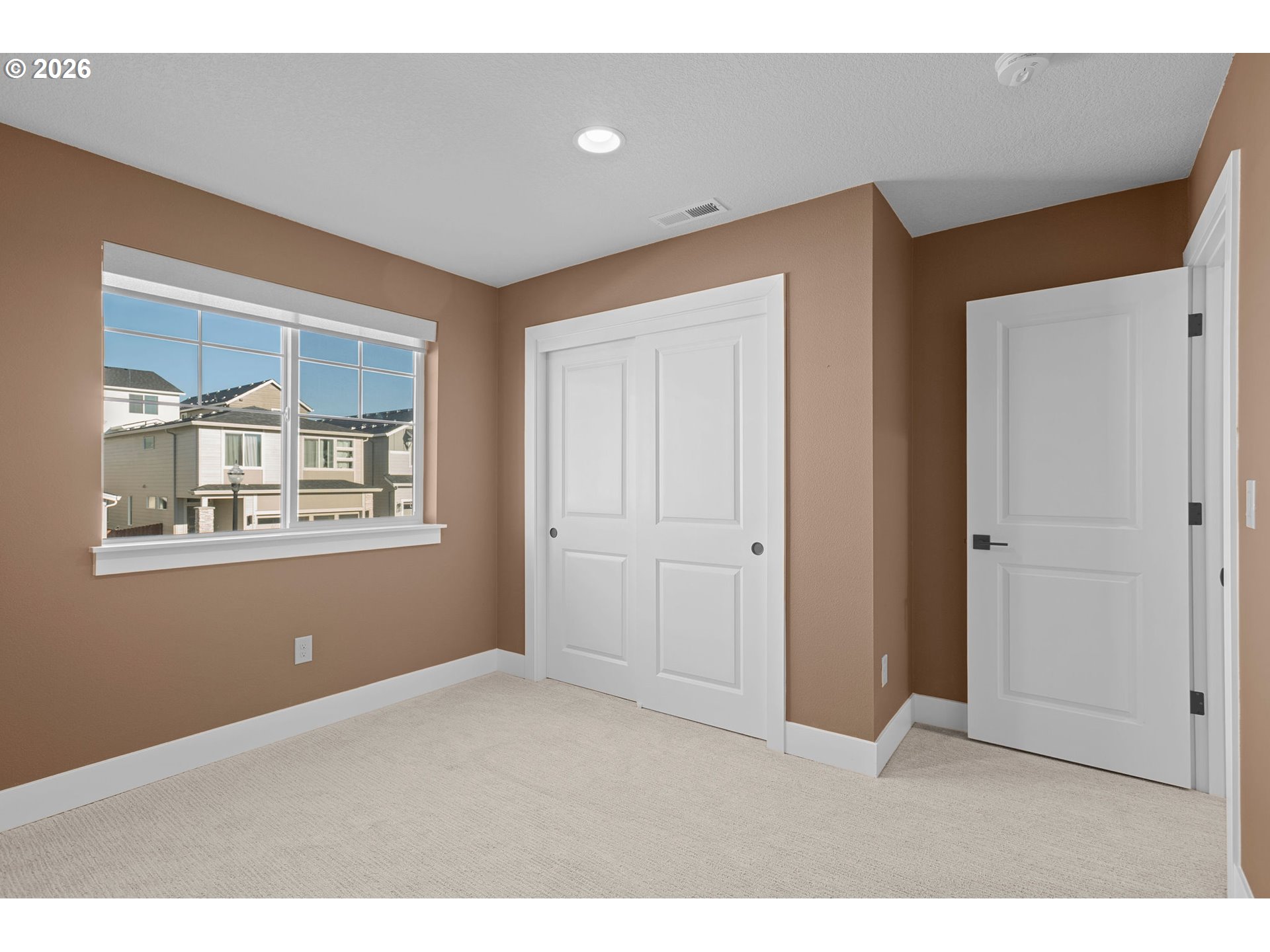 719 Northwest 178th Street Ridgefield, WA 98642 - Photo 37 of 46 a big room with windows and closet