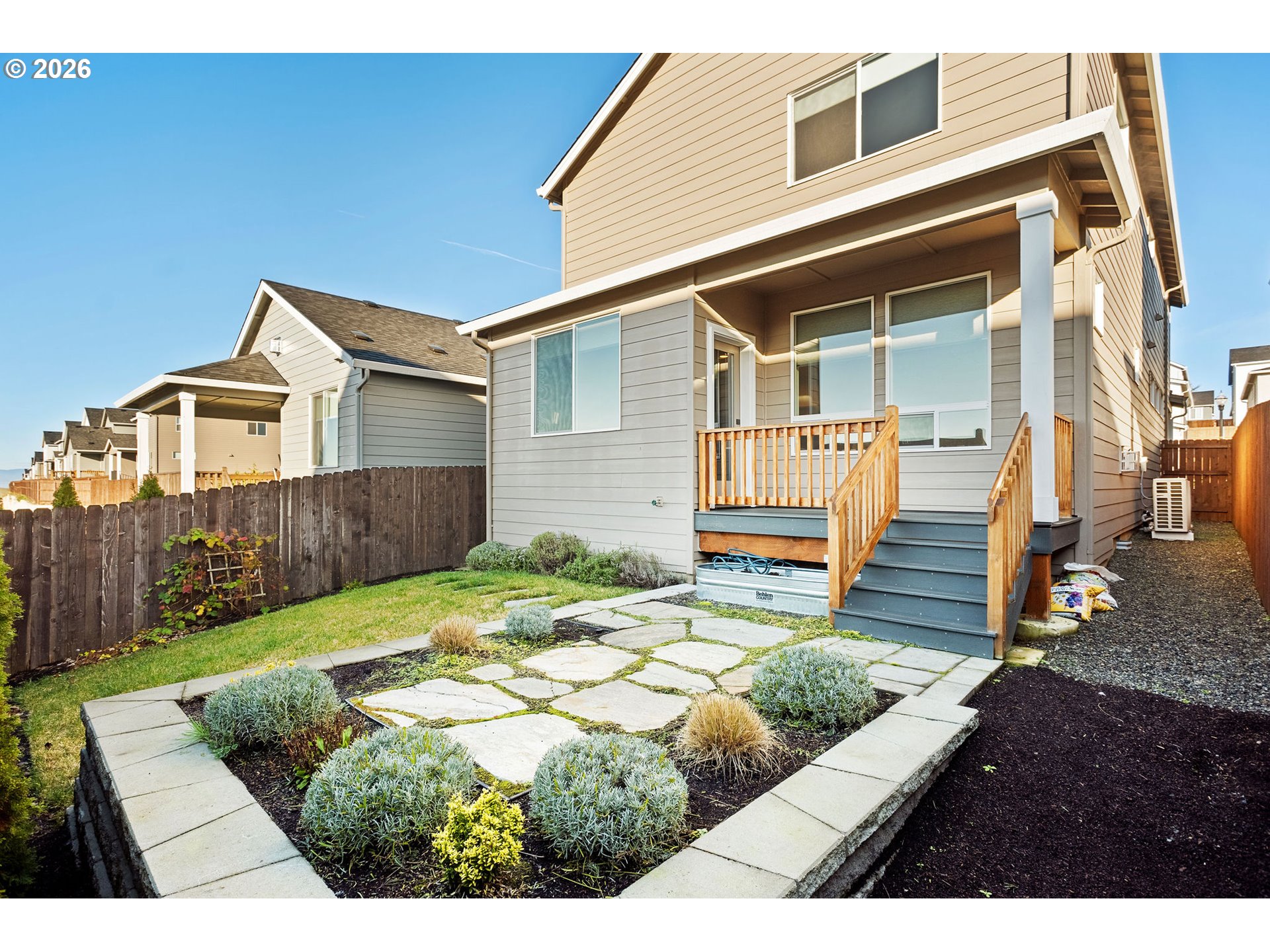 719 Northwest 178th Street Ridgefield, WA 98642 - Photo 45 of 46 a front view of a house with a yard