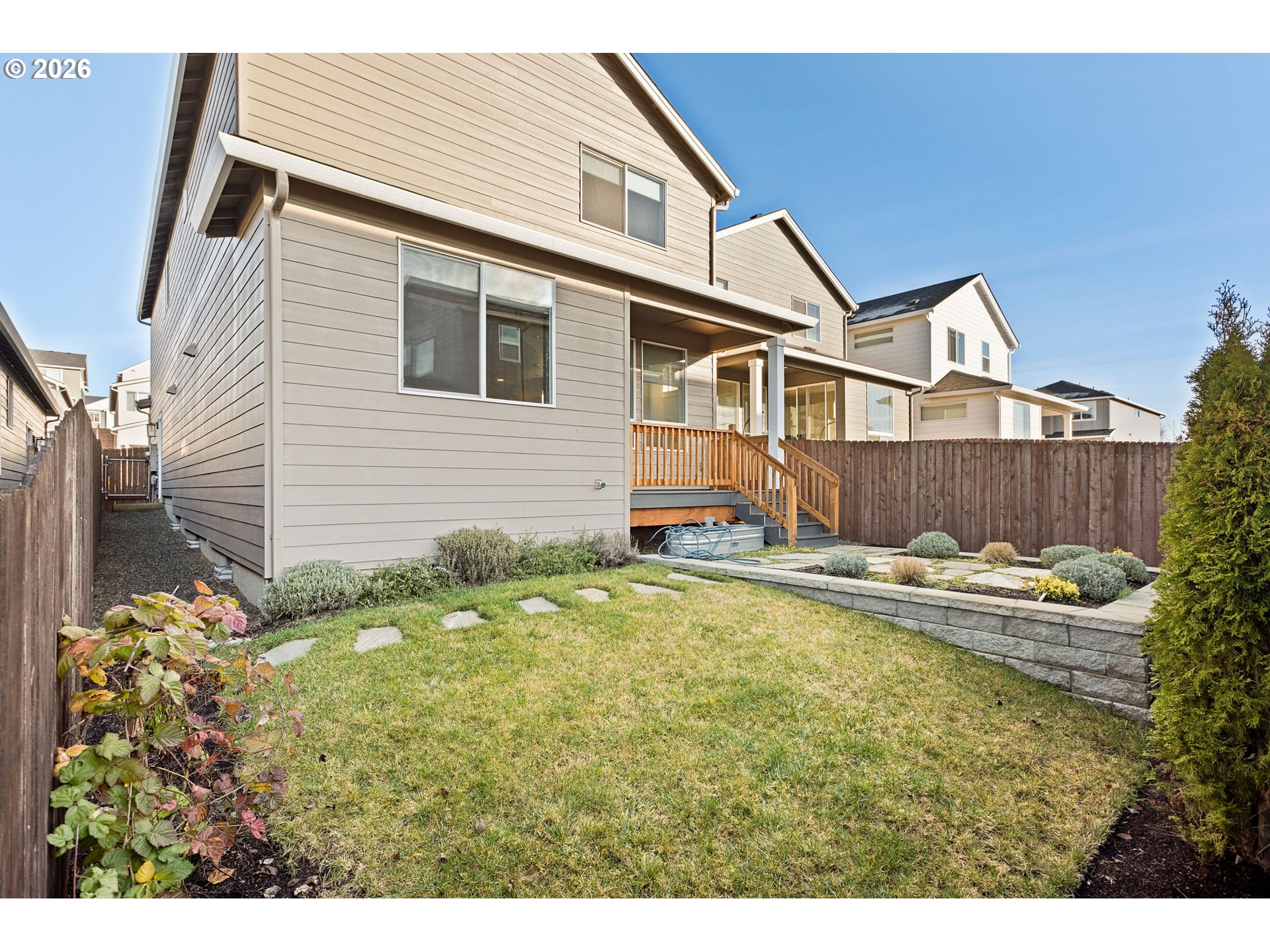 719 Northwest 178th Street Ridgefield, WA 98642 - Photo 46 of 46 a view of a house with backyard and sitting area