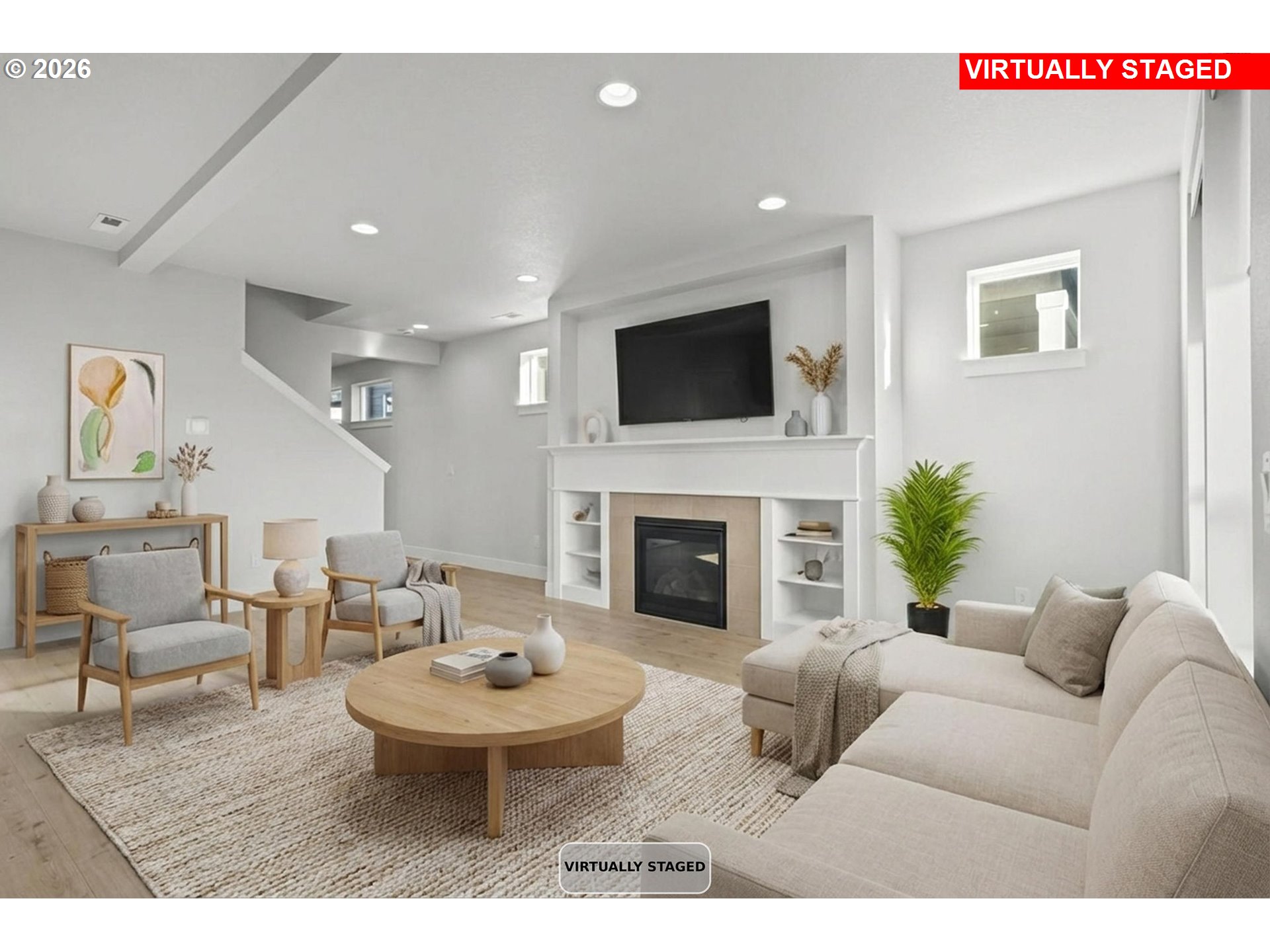 719 Northwest 178th Street Ridgefield, WA 98642 - Photo 7 of 46 a living room with furniture a fireplace and a flat screen tv
