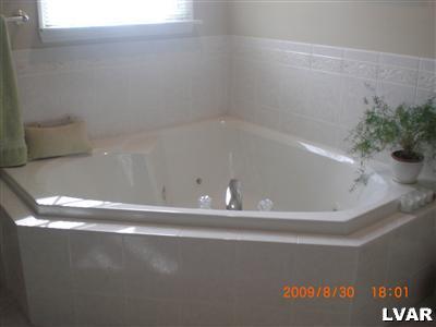 1585 Deer Path Road Easton, PA 18040 - Photo 15 of 28 Jetted corner tub with tile surround
