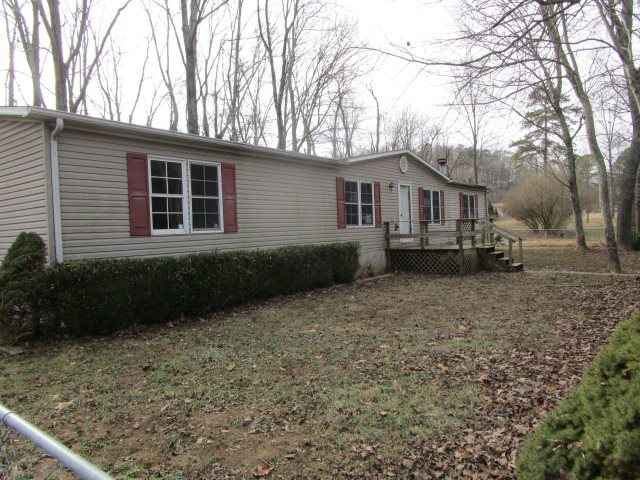 2160 Mt Torrey Road Lyndhurst, VA 22952 - Photo 1 of 16 a front view of a house with a garden