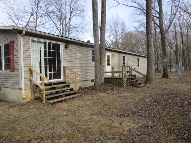 2160 Mt Torrey Road Lyndhurst, VA 22952 - Photo 11 of 16 a view of a house with a yard and wooden fence