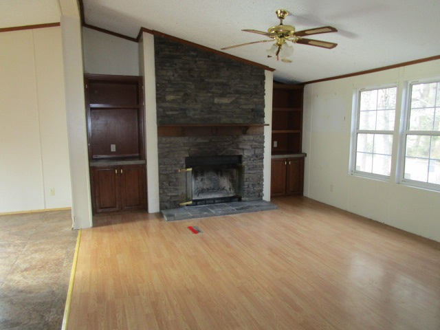 2160 Mt Torrey Road Lyndhurst, VA 22952 - Photo 5 of 16 a view of empty room with fireplace and fan