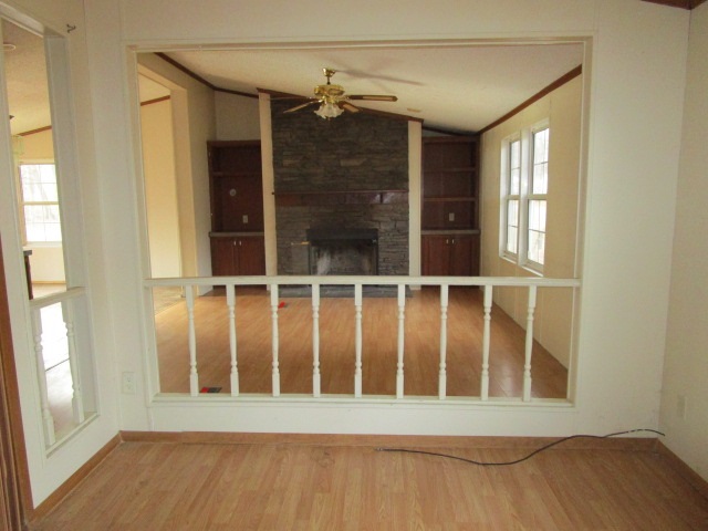 2160 Mt Torrey Road Lyndhurst, VA 22952 - Photo 6 of 16 a view of an empty room with wooden floor and a window