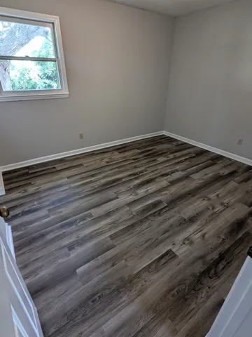 a view of small space with racks on the wall