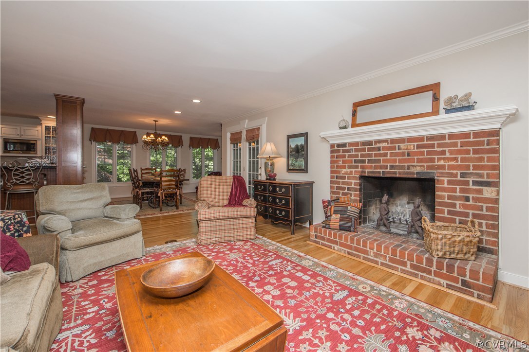 13124 Queensgate Road Midlothian, VA 23114 - Photo 13 of 50 a living room with furniture and a fireplace