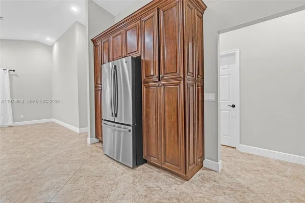 an empty room with closet area