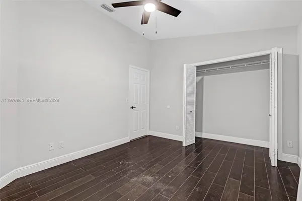 a bathroom with a toilet bathtub and shower