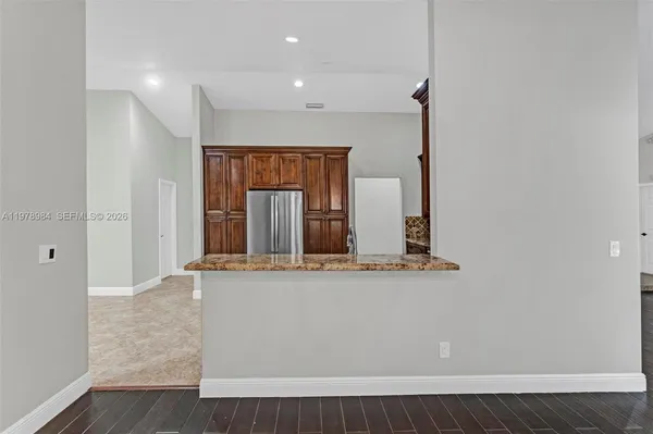 wooden floor and window in a room