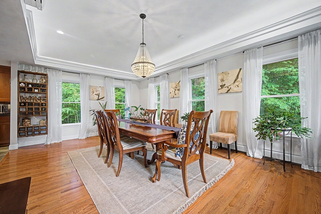 4 Dicarlo Road Hopkinton, MA 01748 - Photo 7 of 41 a view of a dining room with furniture window and wooden floor