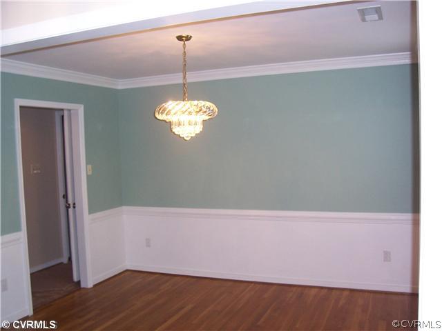 1208 Tree Ridge Road Henrico, VA 23231 - Photo 5 of 21 a view of wooden floor and chandelier in a room