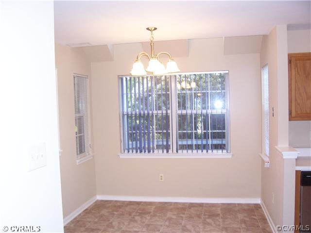 1208 Tree Ridge Road Henrico, VA 23231 - Photo 10 of 21 a view of entryway with a window and chandelier