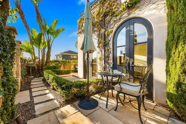 a outdoor living space with furniture and a fireplace