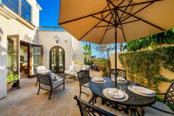 a view of a backyard with swimming pool