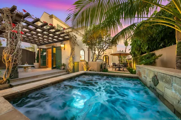 a living room with furniture fireplace and a flat screen tv