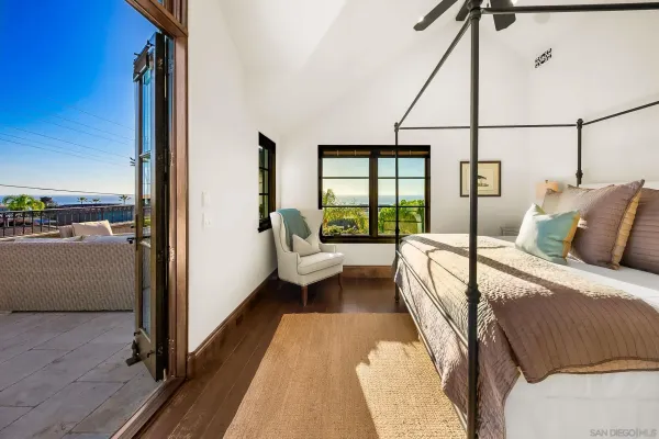 a bathroom with a toilet a sink and a mirror