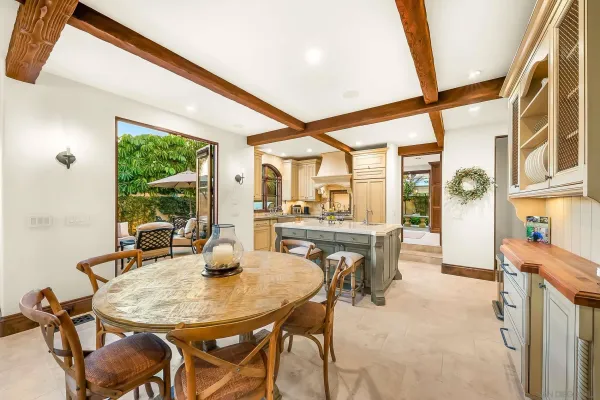 a kitchen with stainless steel appliances a stove sink and cabinets