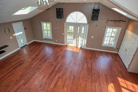a house with trees in the background