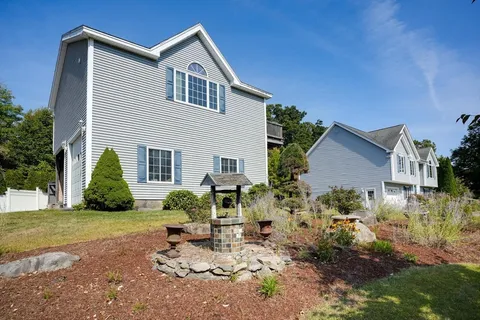 a house view with a garden space