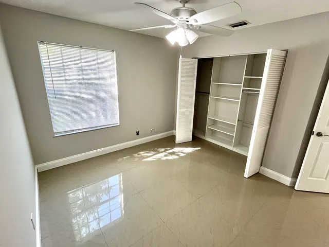 a view of an empty walk in closet