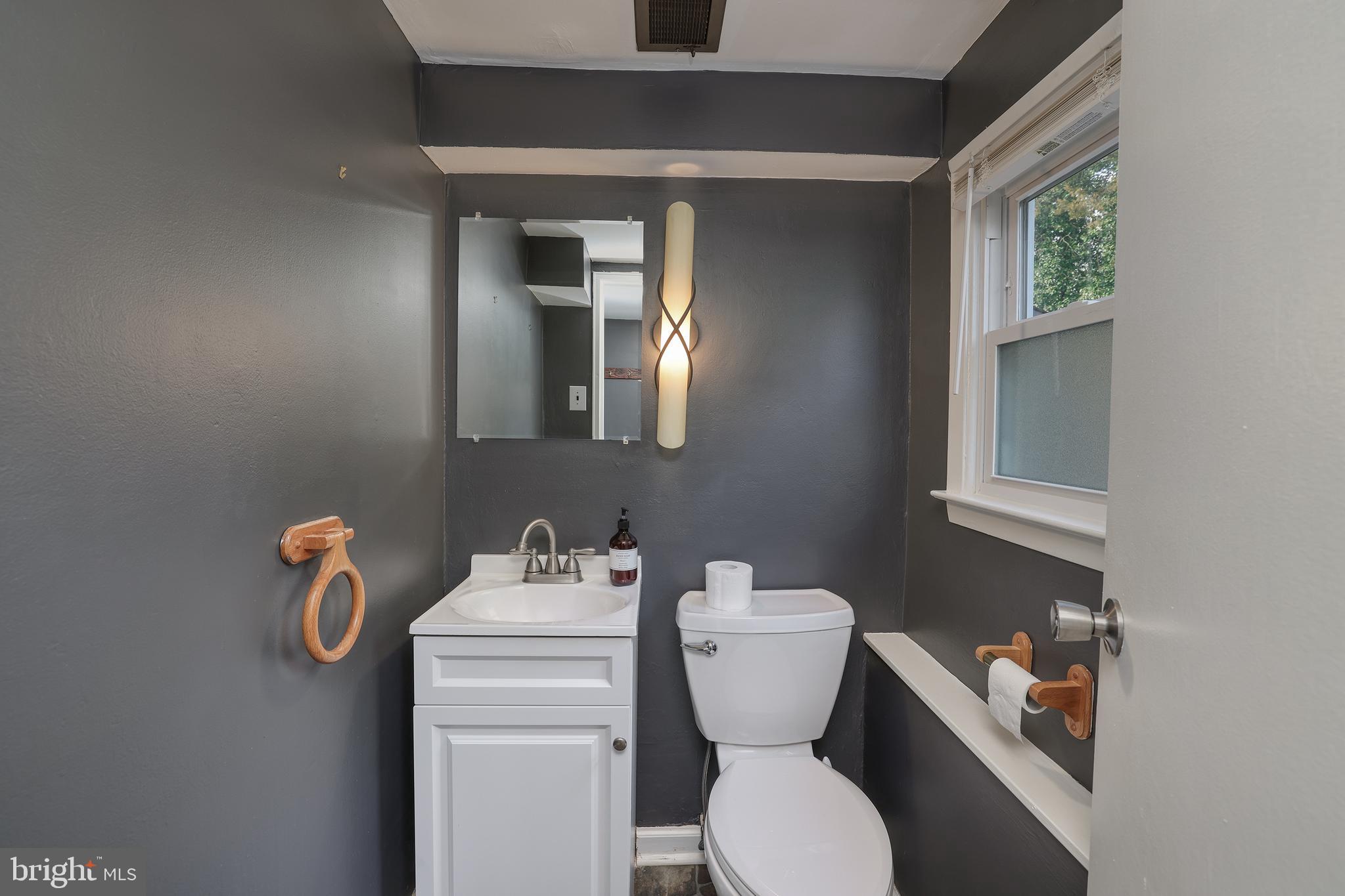 6 Van Gogh Court Ewing, NJ 08618 - Photo 20 of 25 a bathroom with a toilet sink and mirror