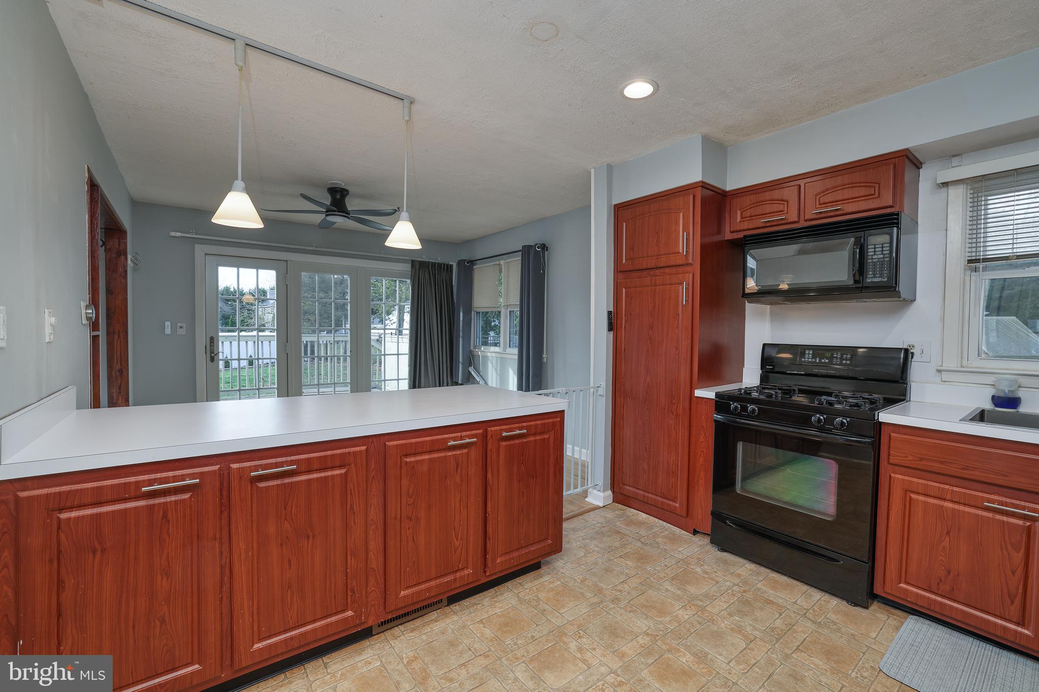6 Van Gogh Court Ewing, NJ 08618 - Photo 6 of 25 a kitchen with stainless steel appliances granite countertop a stove a sink and a refrigerator