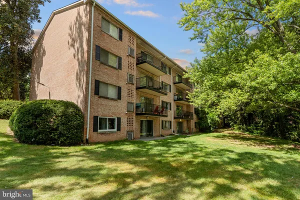 a view of a building with a garden