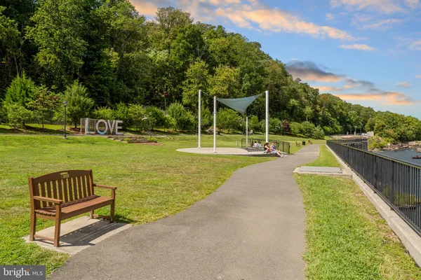 a view of swimming pool from a balcony