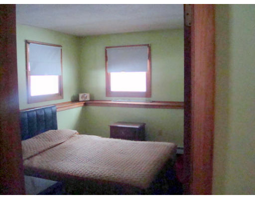 109 Mason Road Dudley, MA 01571 - Photo 7 of 9 a bedroom with a bed and a window