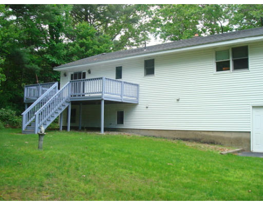 109 Mason Road Dudley, MA 01571 - Photo 8 of 9 a view of a house with a backyard