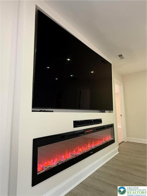 137 Idlewild Road Levittown, PA 19057 - Photo 11 of 36 100” television and electric fireplace