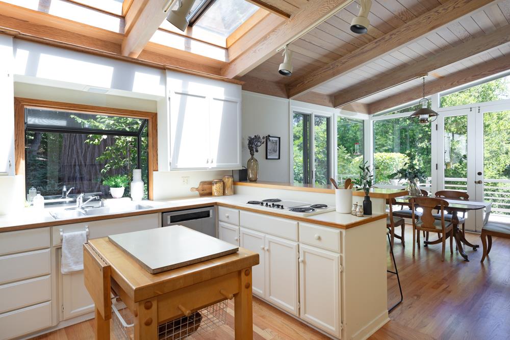 275 Aptos School Road Aptos, CA 95003 - Photo 12 of 45 a kitchen with a stove a sink and a refrigerator