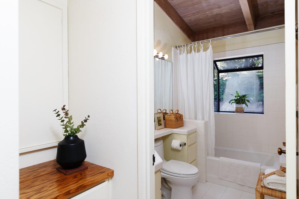275 Aptos School Road Aptos, CA 95003 - Photo 27 of 45 a bath room with a toilet and a shower