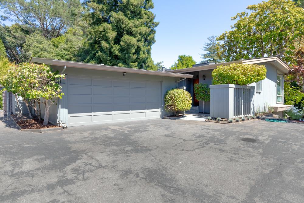 275 Aptos School Road Aptos, CA 95003 - Photo 41 of 45 a backyard of a house with plants and trees