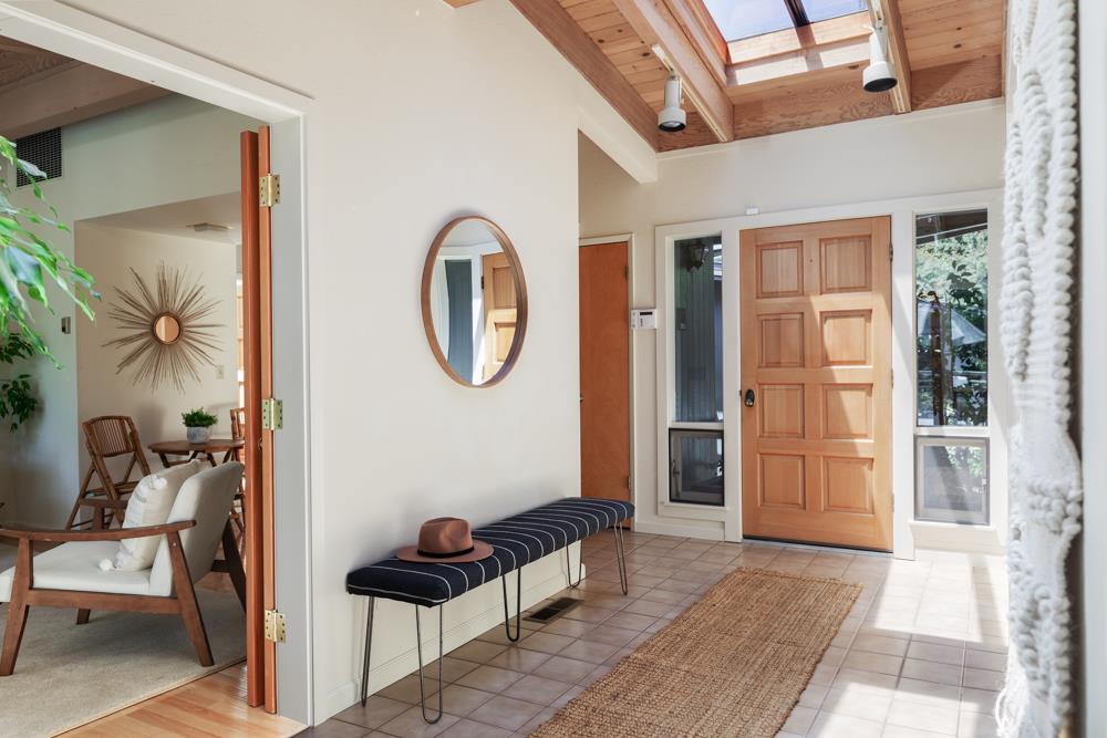 275 Aptos School Road Aptos, CA 95003 - Photo 5 of 45 a view of a livingroom with furniture and windows