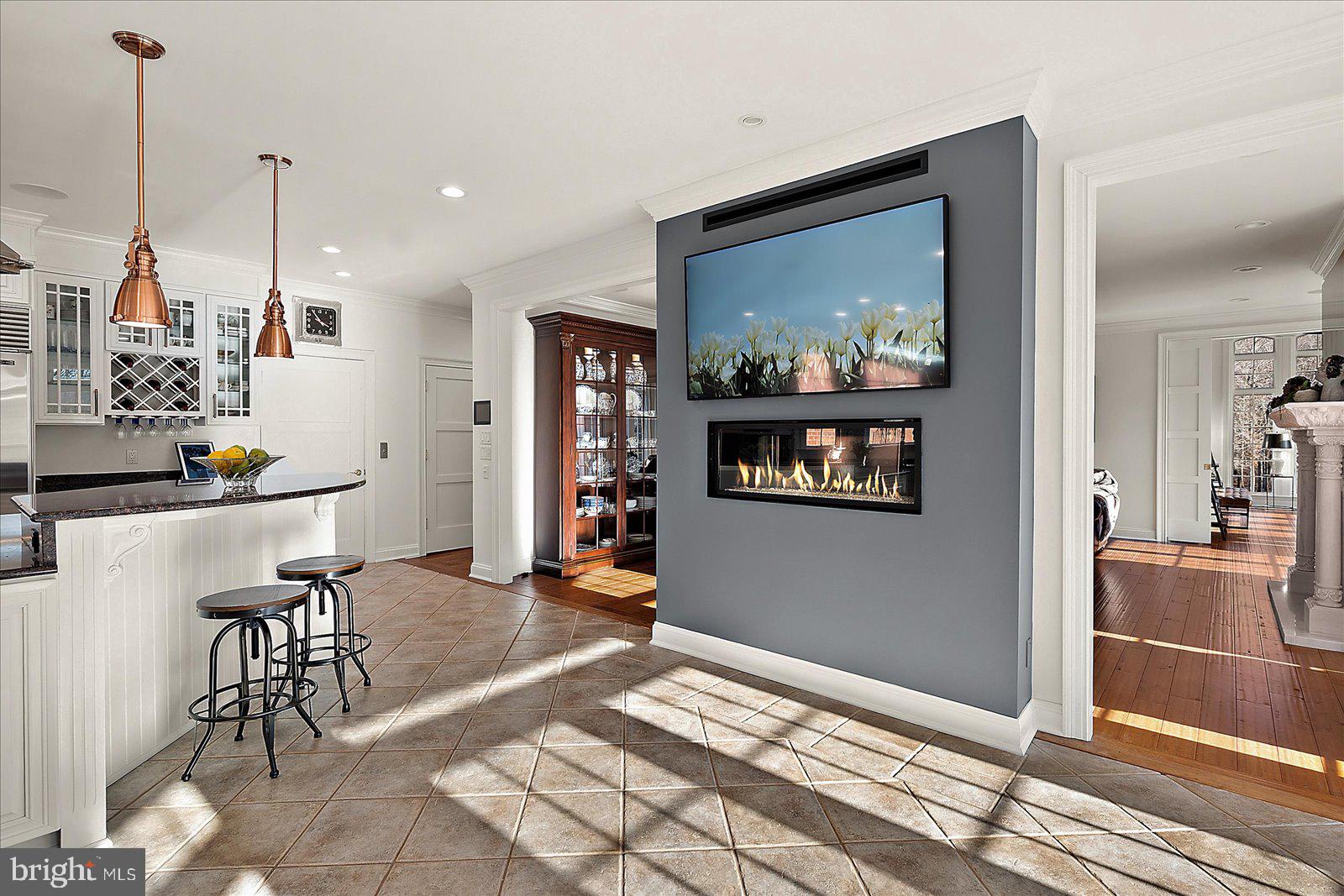 17 Perder Lane Edgewater, MD 21037 - Photo 29 of 115 Focal point of kitchen is elegant fireplace