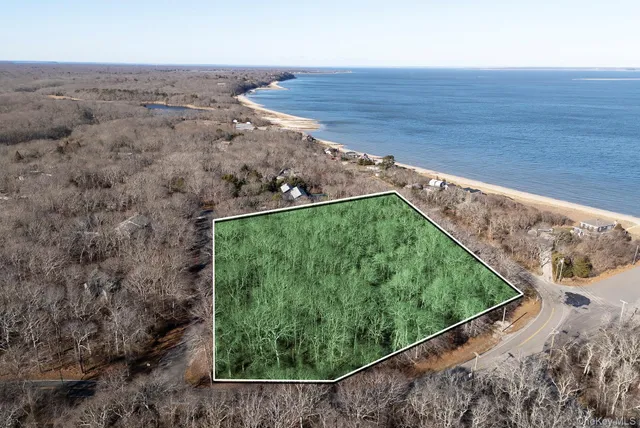 a view of a back yard from a balcony