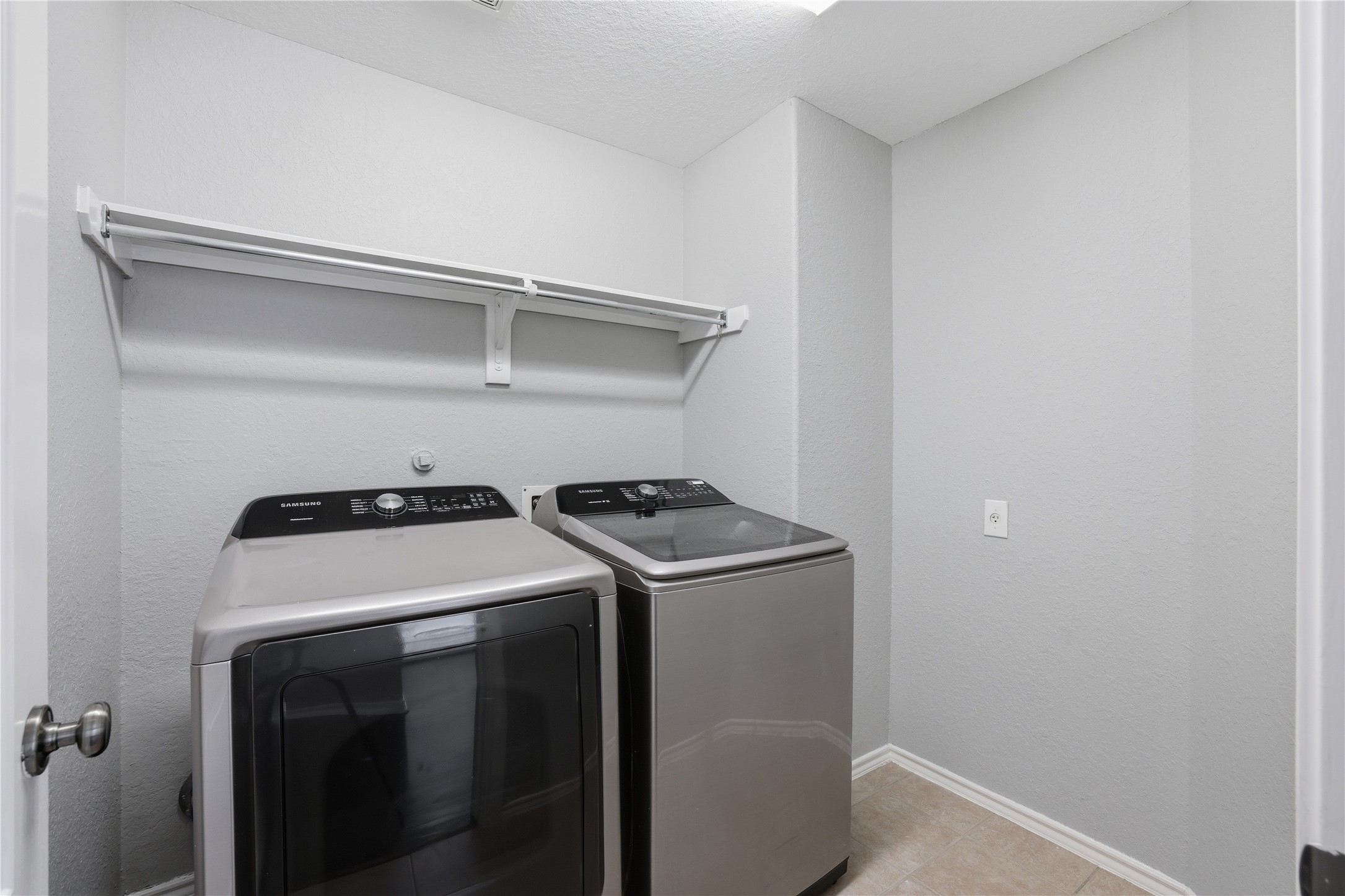 28547 Connordale Lane Spring, TX 77386 - Photo 16 of 16 Comveniently located large laundry room with washer and dryer.